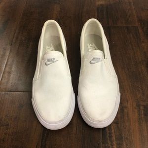 White Nike slip on shoe size 7.5